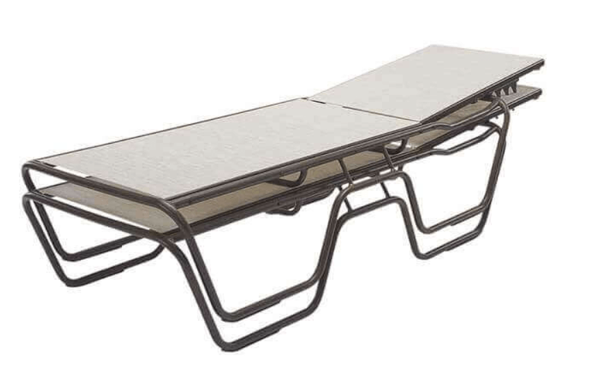 Stacked sling chaise lounges ready for storage after pool season.
